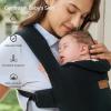 imageMomcozy Newborn Carrier WeeSnug Lightweight and Cozy Comfort for 725 lbs Ergonomic CrossBack Support Effortless to Put On HandsFree Baby Carrier with Lumbar Support KhakiBlack